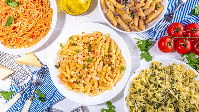 A variety of delicious prepared pasta meals.