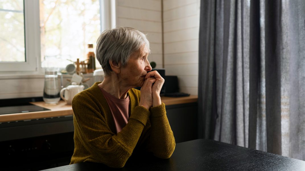 An elderly woman suffering the hard truth about mental health and aging