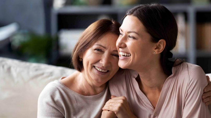 Mother and Daughter laughing together