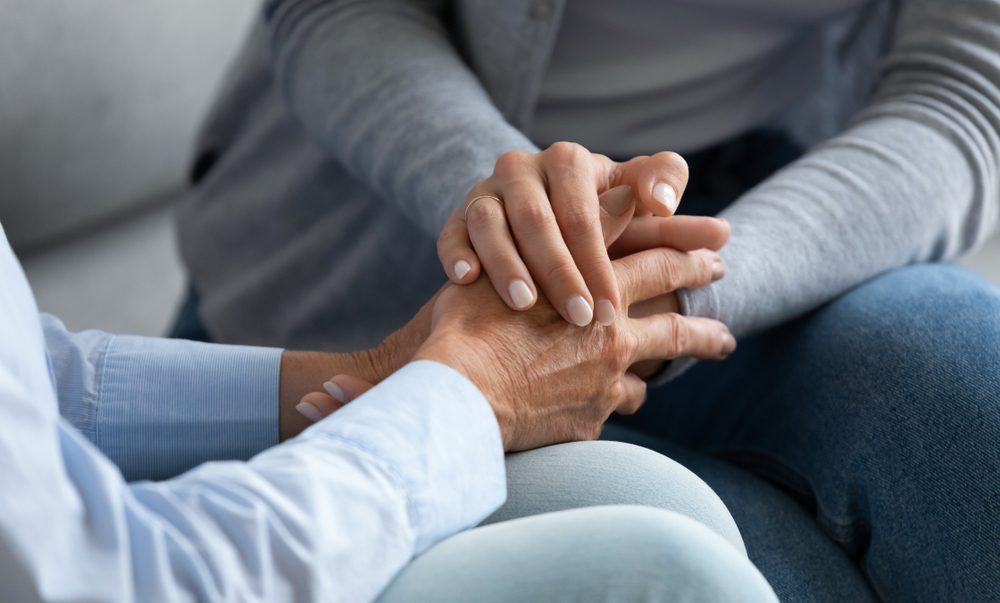 Young,Woman,Granddaughter,Daughter,Hold,Old,Female,Hand,Of,Mother