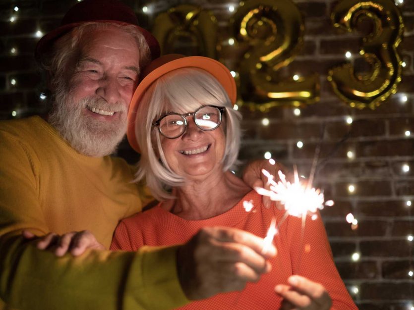 Thriving in 2025: 5 ways to stick with your health goals 6 senior couple celebrating new year
