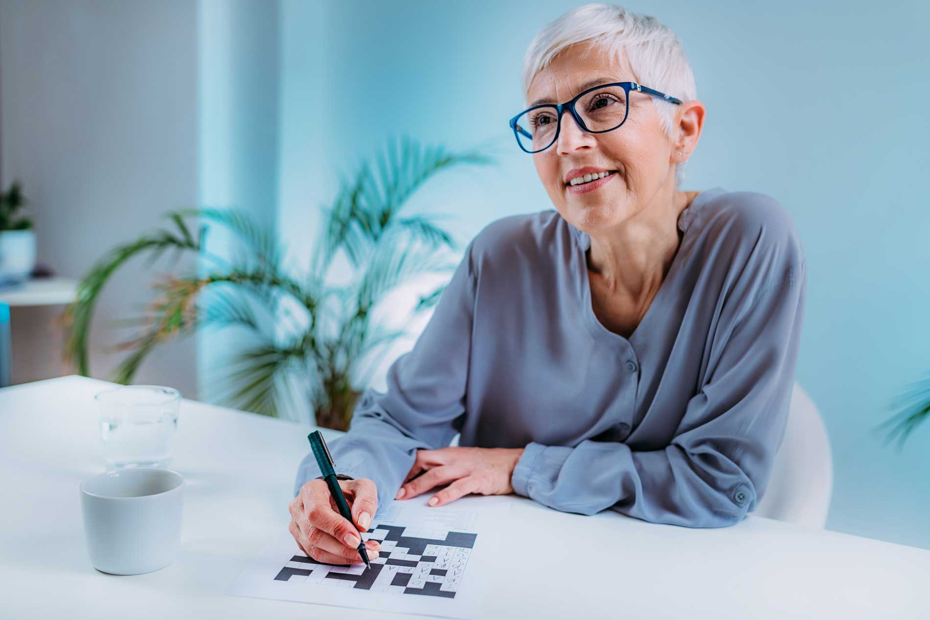 senior-lady-playing-sudoku