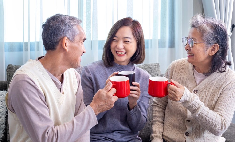Three people enjoying hot chocolate together - viral hot chocolate recipe