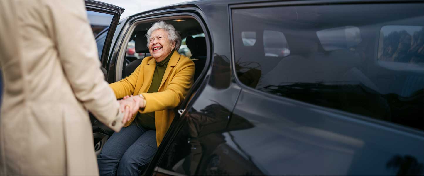 Older adult using transportation services