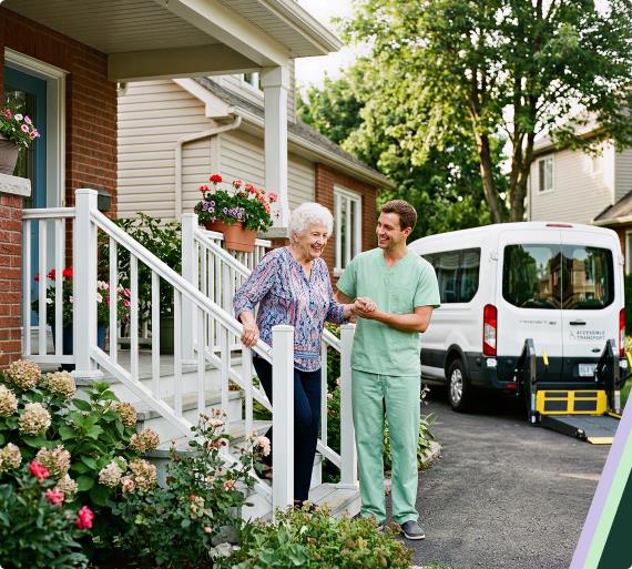 Caregiver assisting elderly woman outdoors