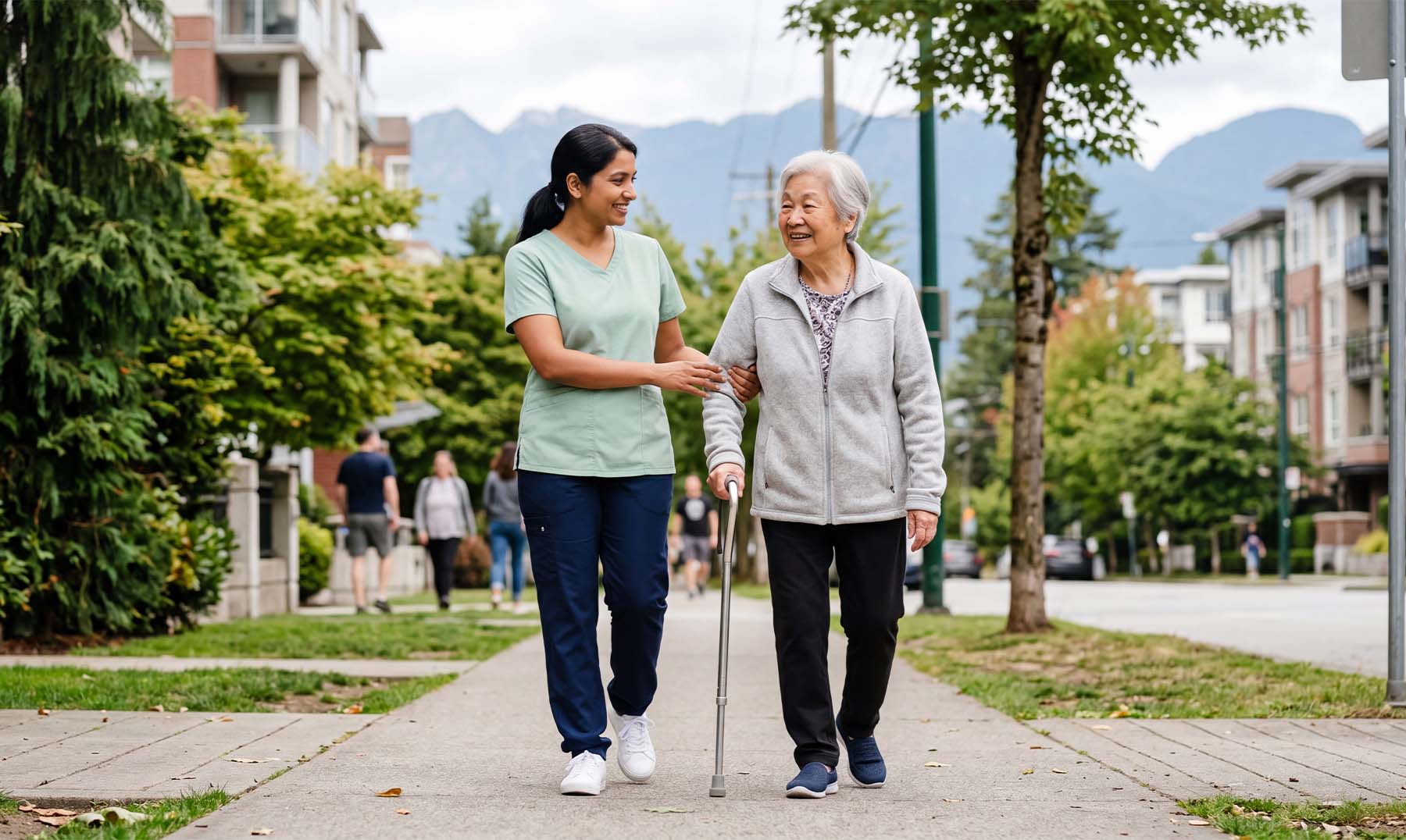 Older woman walking on the street with the help of a caregiver