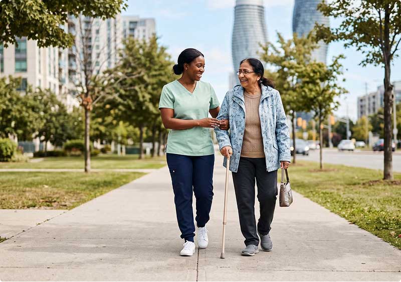 Older adults and caregiver walking in Mississauga